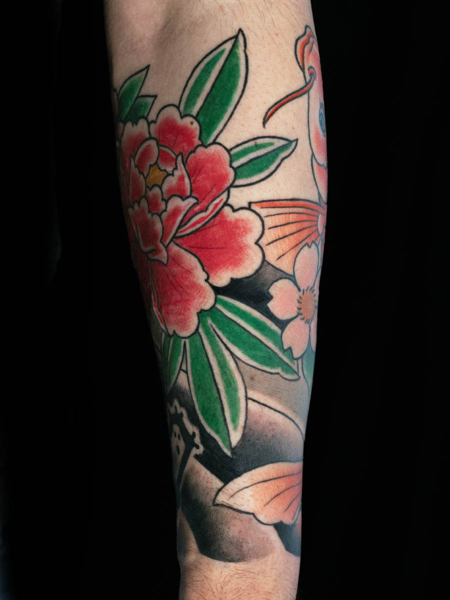 Jonathan botan koi lower sleeve inner arm Japanese tattoo Atlanta Georgia by Brian Bennett at Ink and Dagger