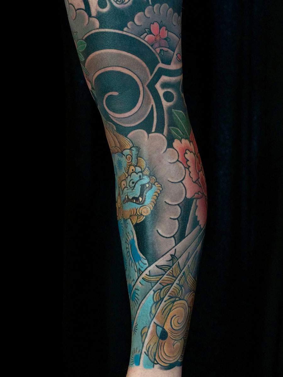 Jordan karashishi botan leg sleeve wraparound cloud work Japanese tattoo Atlanta Georgia by Brian Bennett at Ink and Dagger