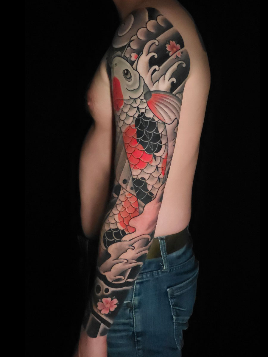 Joseph koi sleeve Japanese tattoo Roswell Georgia by Brian Bennett at Ink and Dagger
