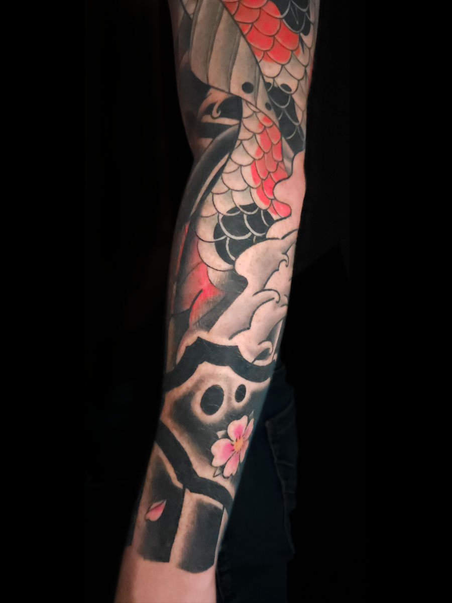 Joseph koi sleeve lower arm wave rock cherry blossom detail Japanese tattoo Roswell Georgia by Brian Bennett