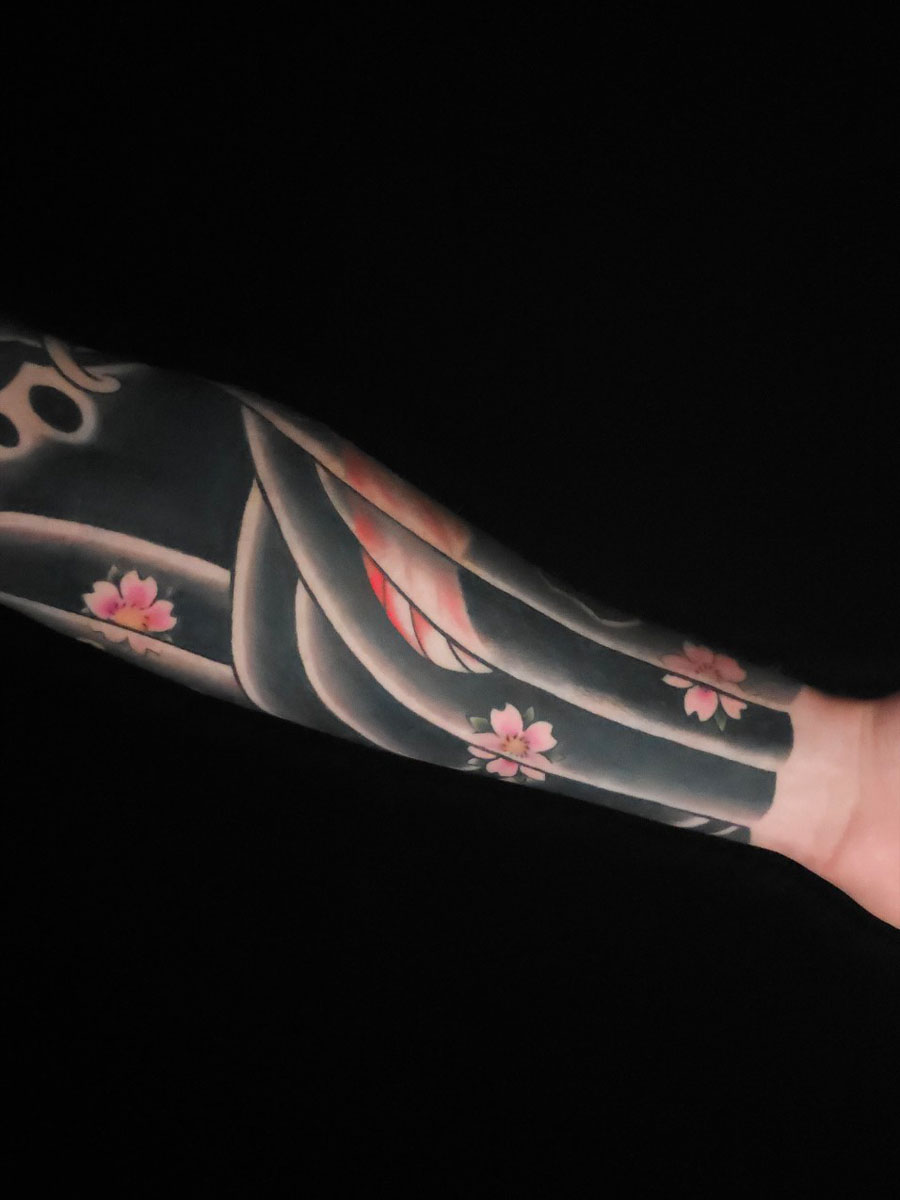 Joseph koi sleeve rear view full composition Japanese tattoo Roswell Georgia by Brian Bennett at Ink and Dagger