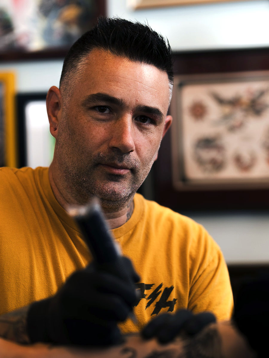 Brian Bennett tattoo artist portrait at Ink and Dagger Roswell Georgia