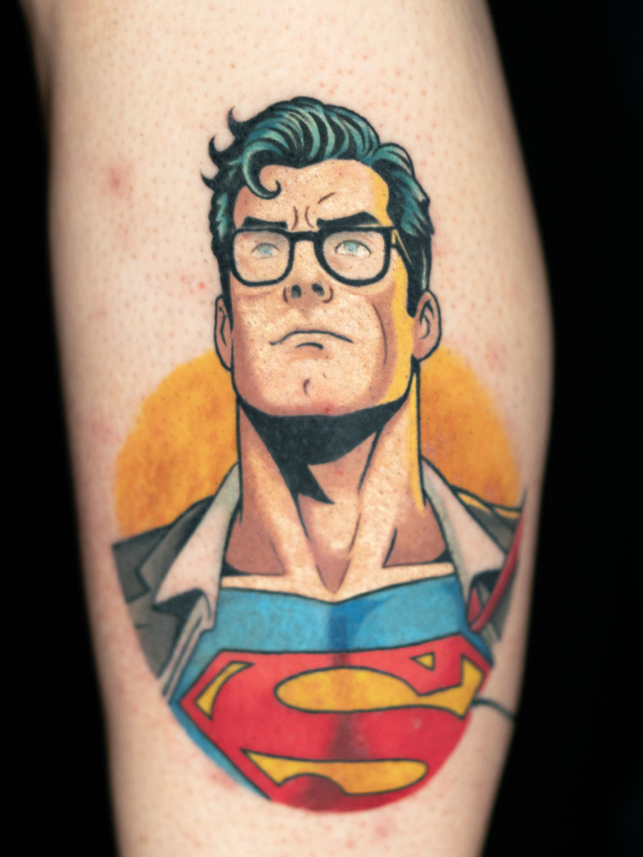 Superman Clark Kent comic style tattoo Roswell Georgia by Brian Bennett at Ink and Dagger — DC character tattoo Atlanta