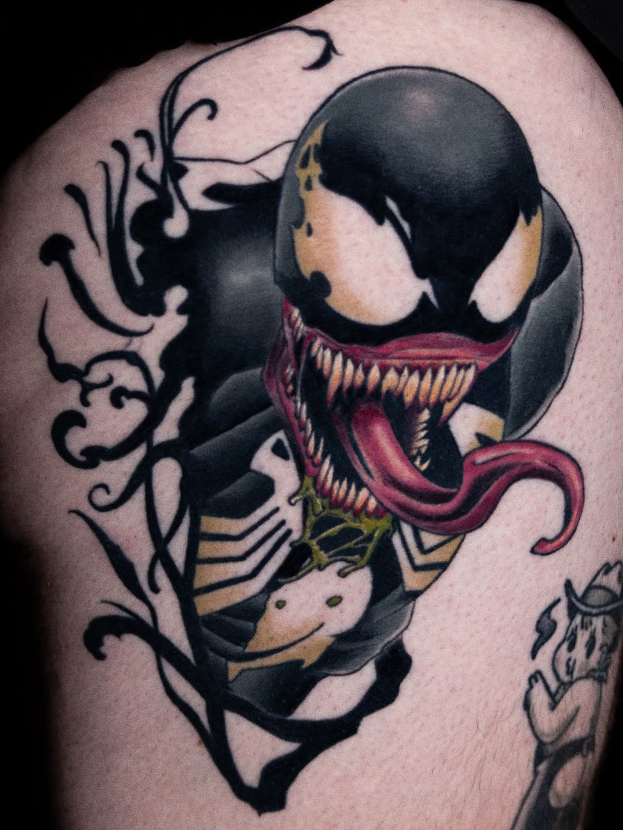 Venom comic style tattoo Atlanta Georgia by Brian Bennett at Ink and Dagger — Marvel symbiote character tattoo