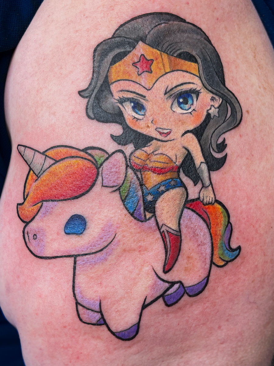 Wonder Woman unicorn chibi anime style tattoo Atlanta Georgia by Brian Bennett at Ink and Dagger — DC character tattoo